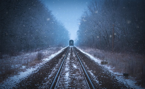 Train tracks in winter mist